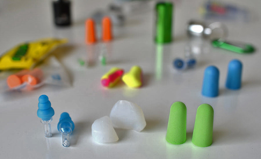 Pre-molded, formable, and foam earplugs side by side